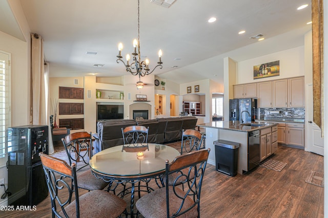 2041 E Palm Beach Dr, Chandler, AZ 85249 - dining area with dark wood-style flooring, a chandelier, lofted ceiling, and recessed lighting