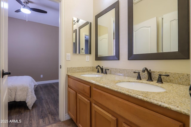 2041 E Palm Beach Dr, Chandler, AZ 85249 - bathroom featuring double vanity, wood finished floors, and ceiling fan