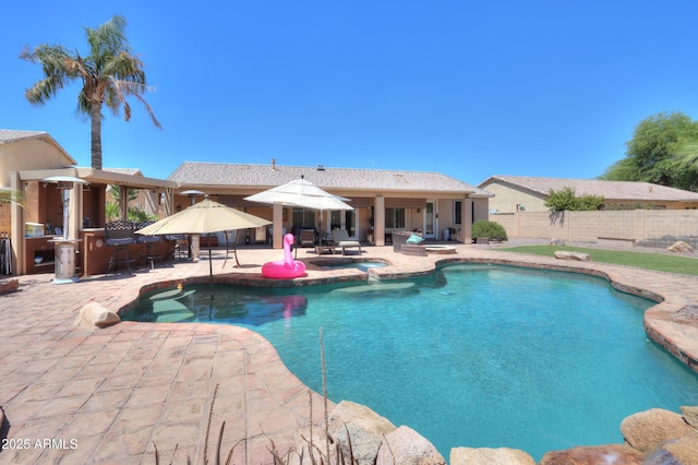 2041 E Palm Beach Dr, Chandler, AZ 85249 - view of swimming pool with a patio and an in-ground hot tub