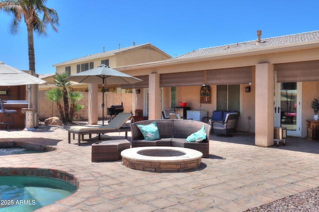 2041 E Palm Beach Dr, Chandler, AZ 85249 - view of patio / terrace with an outdoor living space with a fire pit