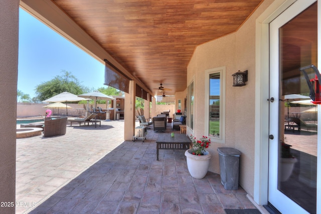 2041 E Palm Beach Dr, Chandler, AZ 85249 - fenced backyard featuring outdoor dining area, a patio, ceiling fan, and outdoor lounge area