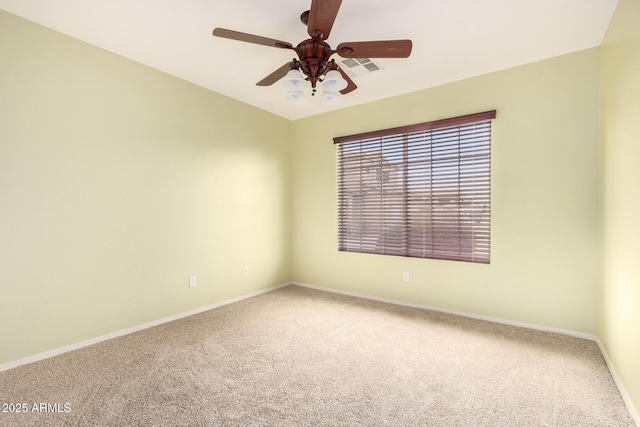 unfurnished room featuring visible vents, ceiling fan, carpet, and baseboards