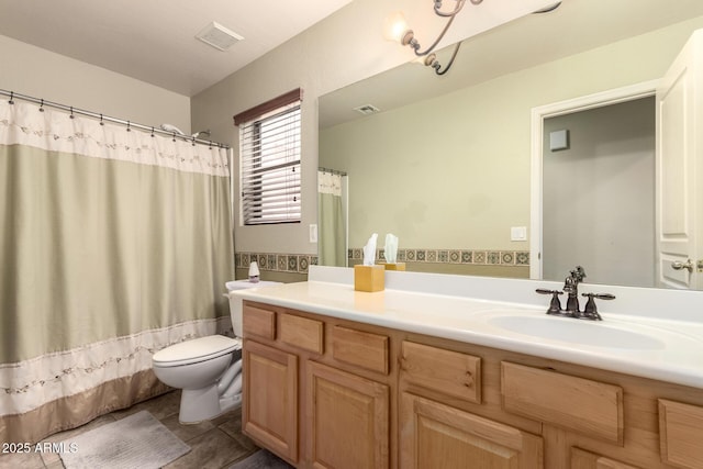 full bath with tile patterned floors, vanity, visible vents, and toilet
