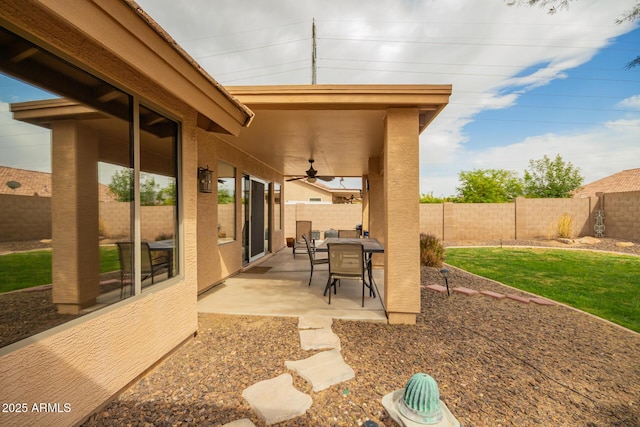 view of patio / terrace featuring a fenced backyard and ceiling fan