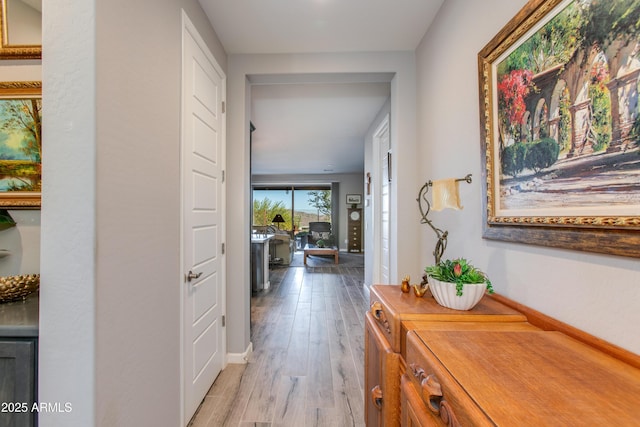 4577 Tenderfoot Way, Wickenburg, AZ 85390 - hallway with baseboards and wood finished floors