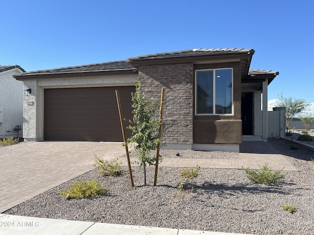 view of front of home with a garage