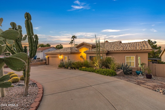 view of front of property with a garage