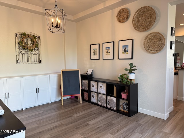 3765 N Denny Way, Buckeye, AZ 85396 - dining space with wood finished floors and a chandelier