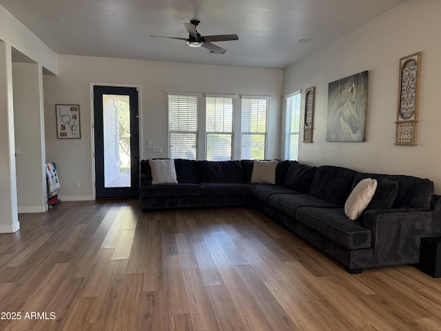 3765 N Denny Way, Buckeye, AZ 85396 - living room with a ceiling fan and light wood-type flooring