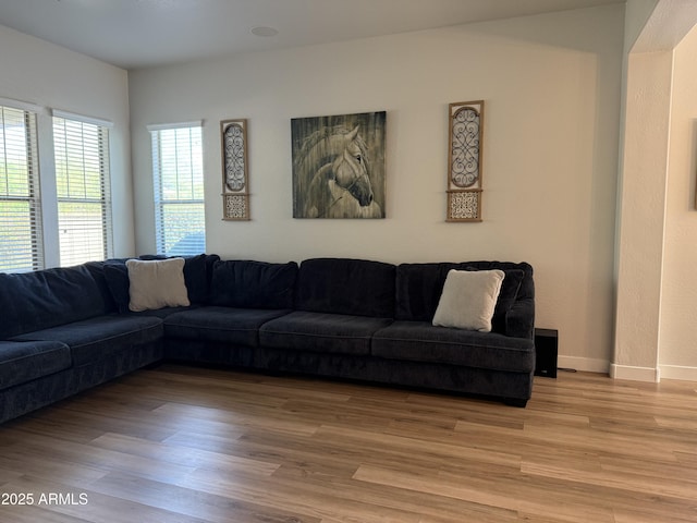 3765 N Denny Way, Buckeye, AZ 85396 - living area featuring light wood finished floors and baseboards