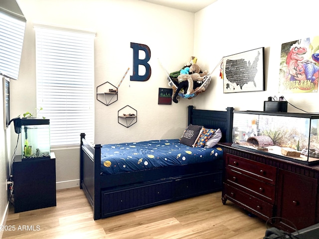 3765 N Denny Way, Buckeye, AZ 85396 - bedroom with light wood-type flooring and baseboards