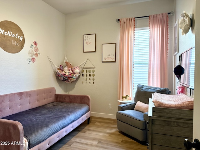 3765 N Denny Way, Buckeye, AZ 85396 - bedroom featuring wood finished floors and baseboards