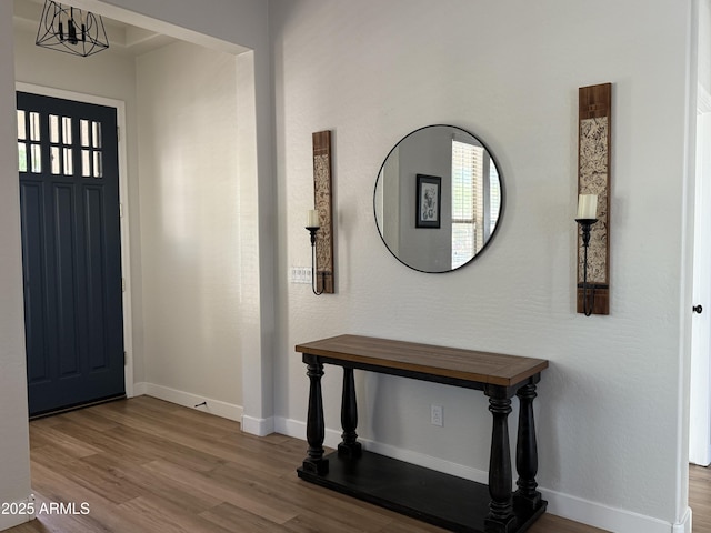 3765 N Denny Way, Buckeye, AZ 85396 - foyer with wood finished floors and baseboards