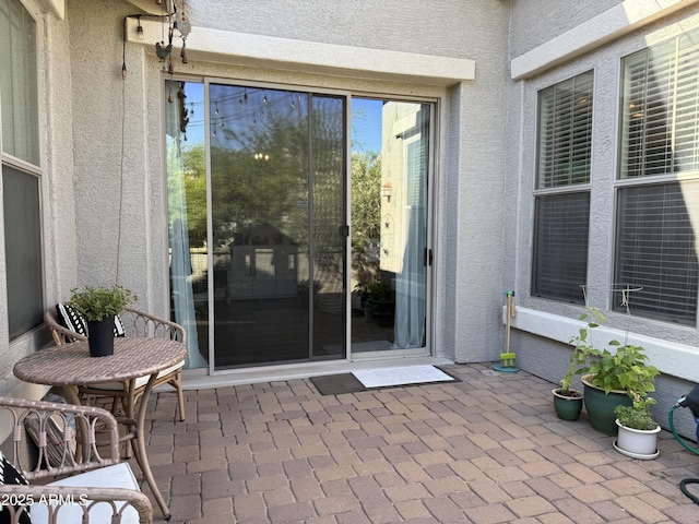 3765 N Denny Way, Buckeye, AZ 85396 - property entrance with a patio area and stucco siding