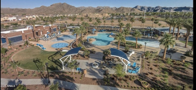3765 N Denny Way, Buckeye, AZ 85396 - aerial view of property and surrounding area with a pool area and mountains