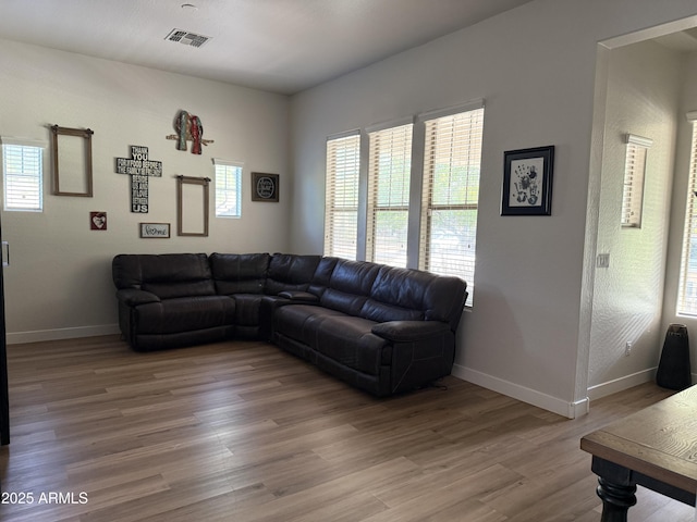 3765 N Denny Way, Buckeye, AZ 85396 - living area with light wood-type flooring and baseboards
