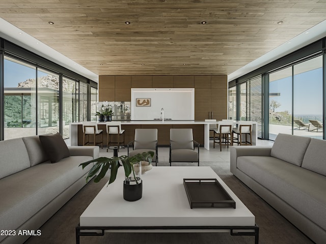 living room featuring wood ceiling, sink, and plenty of natural light