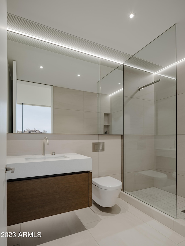 bathroom with walk in shower, vanity, and toilet