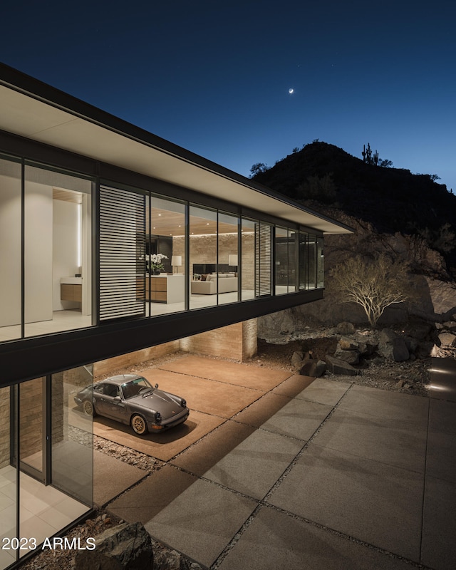 patio at night with a mountain view