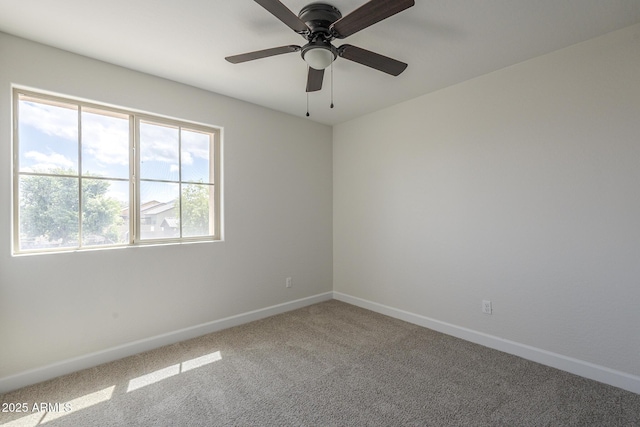 8518 S 8th Ln, Phoenix, AZ 85041 - spare room featuring carpet, baseboards, and ceiling fan