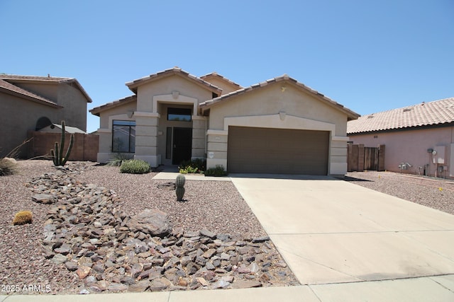 5437 W Bluefield Ave, Glendale, AZ 85308 - view of front of home featuring an attached garage, driveway, and stucco siding