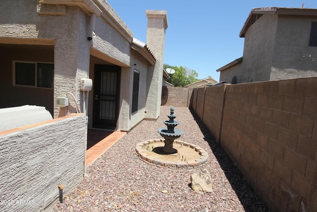 5437 W Bluefield Ave, Glendale, AZ 85308 - view of home's exterior featuring a fenced backyard, stucco siding, and a patio area