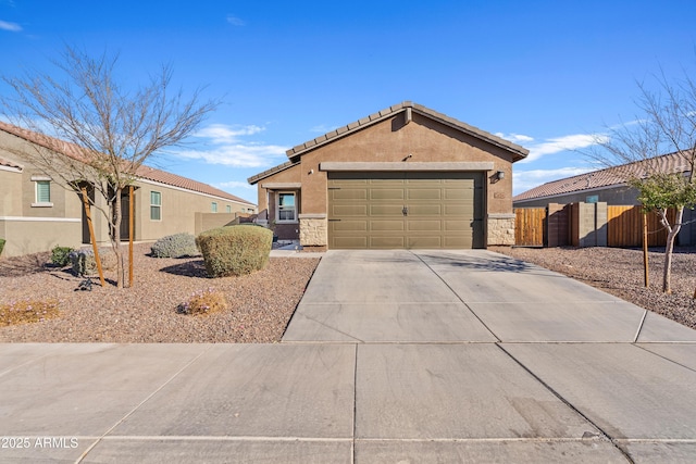 ranch-style house with a garage, concrete driveway, stone siding, fence, and stucco siding