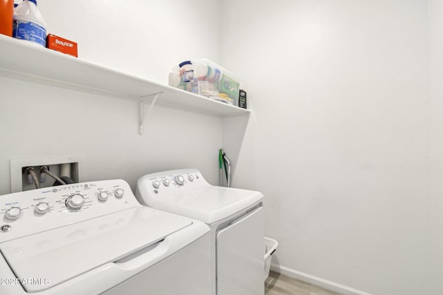 laundry area featuring independent washer and dryer