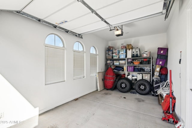 garage featuring a garage door opener