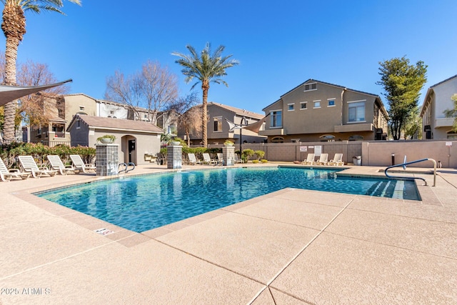 view of swimming pool with a patio