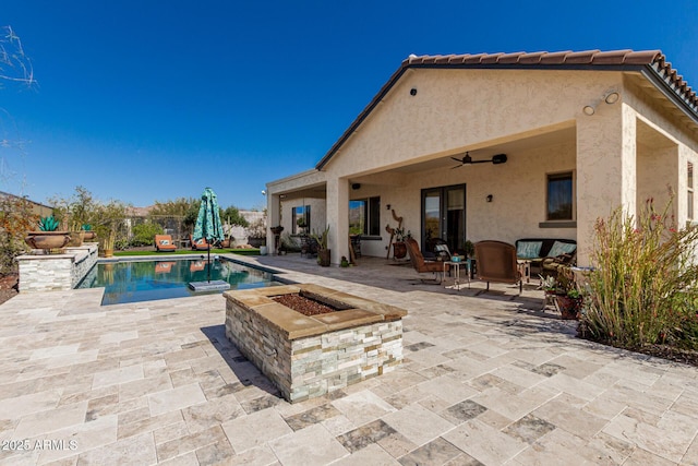 pool featuring a patio area and ceiling fan