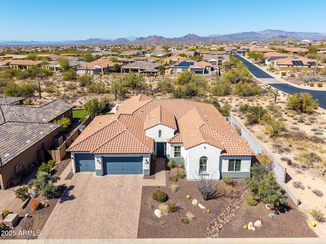 bird's eye view featuring a mountain view and a residential view