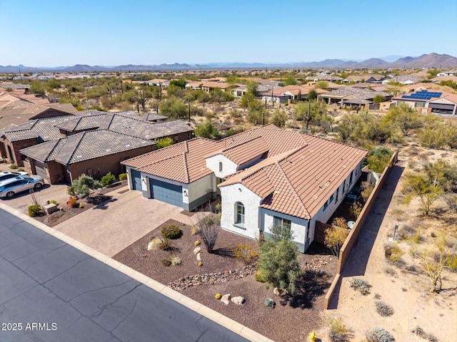 aerial view with a mountain view and a residential view