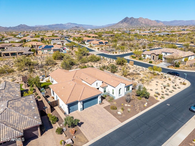 drone / aerial view with a mountain view and a residential view