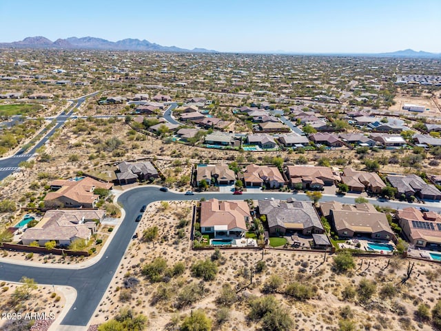 drone / aerial view with a mountain view and a residential view