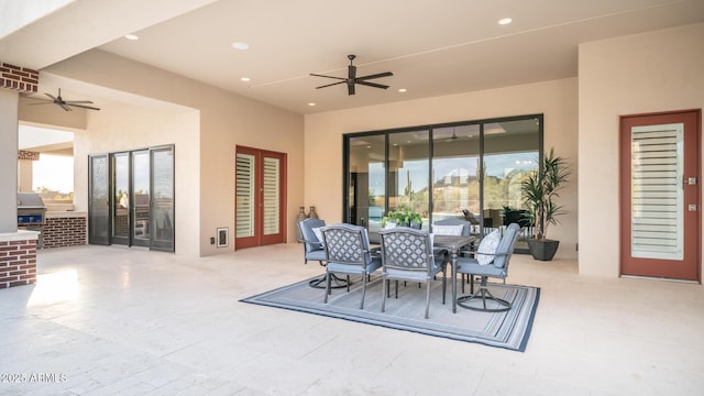 view of patio with ceiling fan