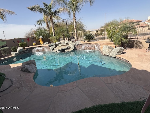 view of pool featuring a fenced in pool, a fenced backyard, and a patio