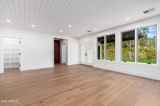 interior space with wood ceiling and light wood-type flooring