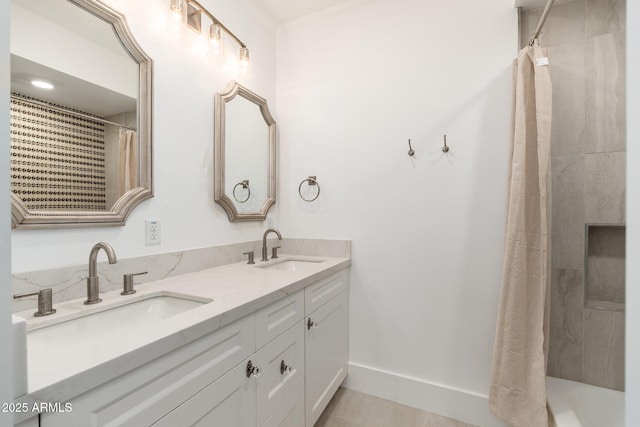 bathroom featuring vanity and walk in shower