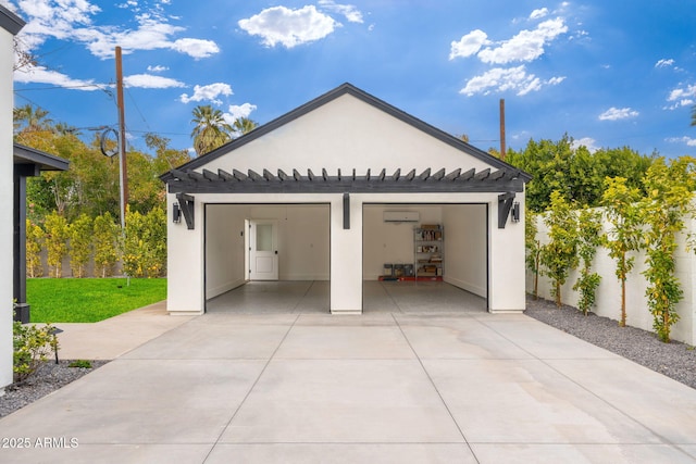 garage featuring a wall unit AC