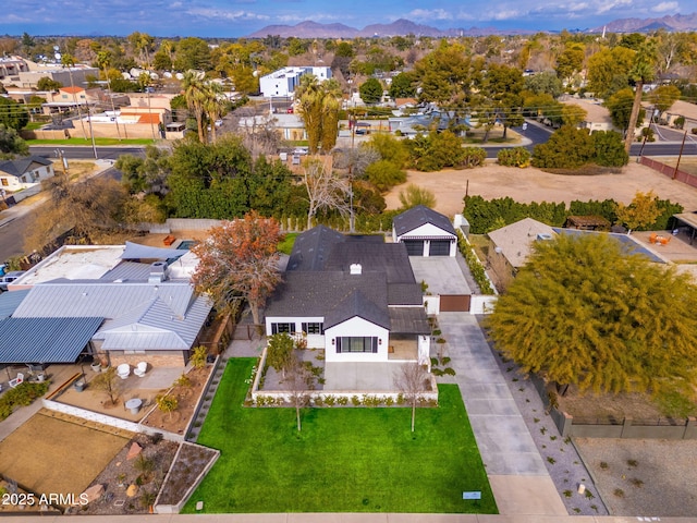 drone / aerial view featuring a mountain view