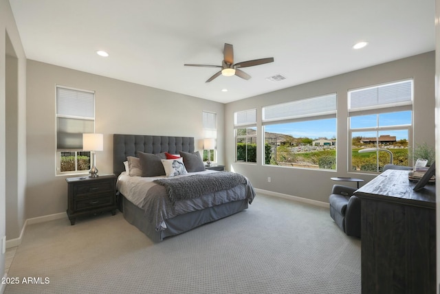 20702 W Hillcrest Blvd, Buckeye, AZ 85396 - bedroom featuring light colored carpet, recessed lighting, and a ceiling fan