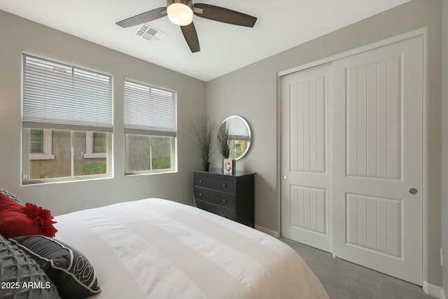 20702 W Hillcrest Blvd, Buckeye, AZ 85396 - carpeted bedroom featuring a closet and ceiling fan