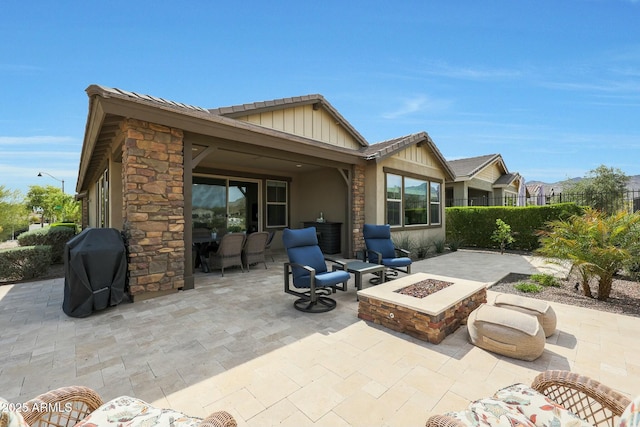 20702 W Hillcrest Blvd, Buckeye, AZ 85396 - view of patio / terrace with a fire pit and a grill