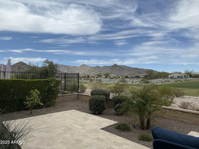20702 W Hillcrest Blvd, Buckeye, AZ 85396 - view of patio / terrace featuring a mountain view