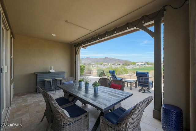 20702 W Hillcrest Blvd, Buckeye, AZ 85396 - view of patio / terrace with a mountain view and outdoor dining area