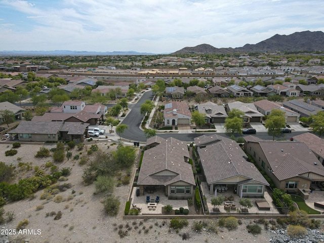 20702 W Hillcrest Blvd, Buckeye, AZ 85396 - aerial view of residential area with a mountainous background