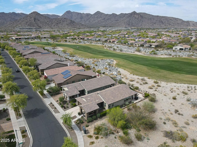20702 W Hillcrest Blvd, Buckeye, AZ 85396 - aerial view of property and surrounding area featuring a local golf course, nearby suburban area, and a mountain backdrop