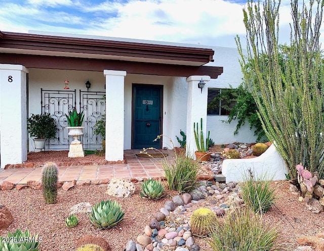 100 N Lazy Fox Rd Unit 8, Wickenburg, AZ 85390 - entrance to property featuring stucco siding and covered porch