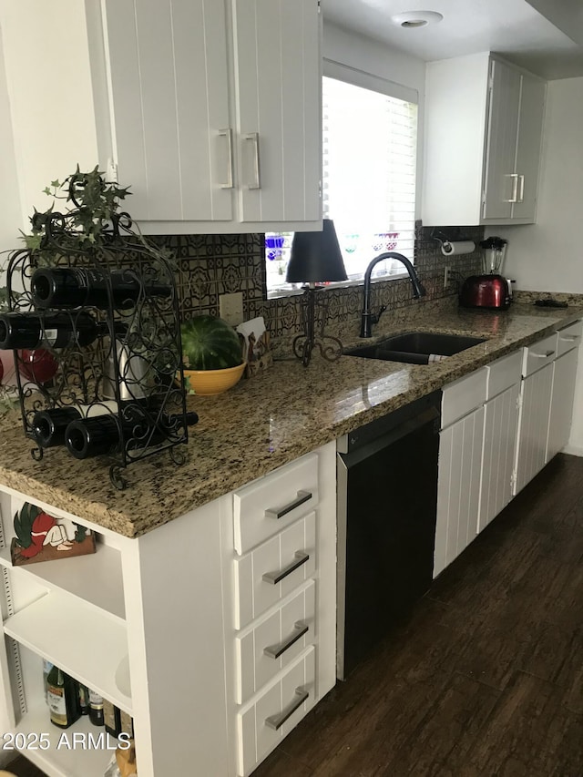 100 N Lazy Fox Rd Unit 8, Wickenburg, AZ 85390 - kitchen featuring black dishwasher, dark wood-style floors, tasteful backsplash, and light stone countertops